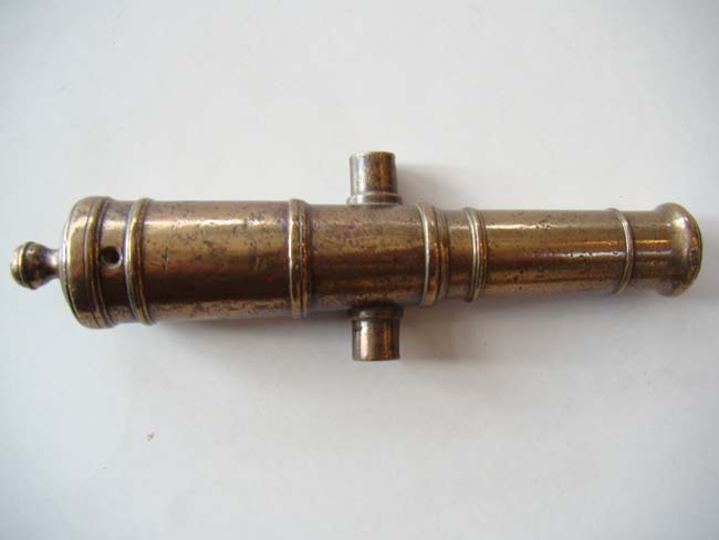 A late 18th or early 19th century miniature bronze cannon circa 1790-1820